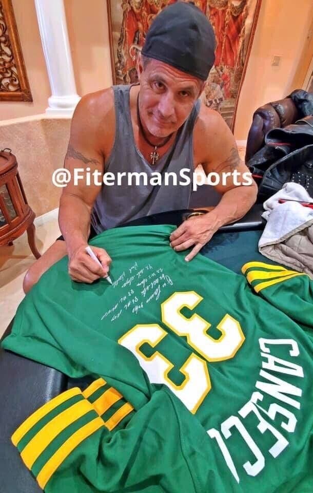 Jose Canseco Signed Autographed Green Jersey FSG Authenticated 7 Inscriptions Jersey jose-canseco-green-fsg-7-inscriptions, view 4, supplier stock photo