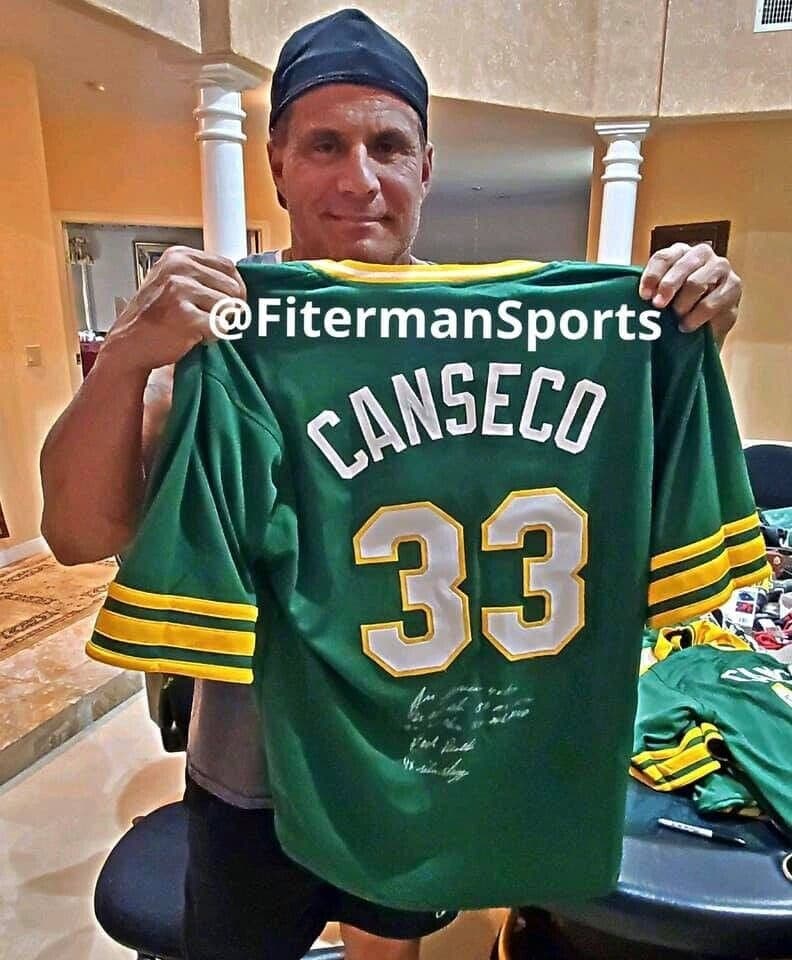 Jose Canseco Signed Autographed Green Jersey FSG Authenticated 7 Inscriptions Jersey jose-canseco-green-fsg-7-inscriptions, view 3, supplier stock photo