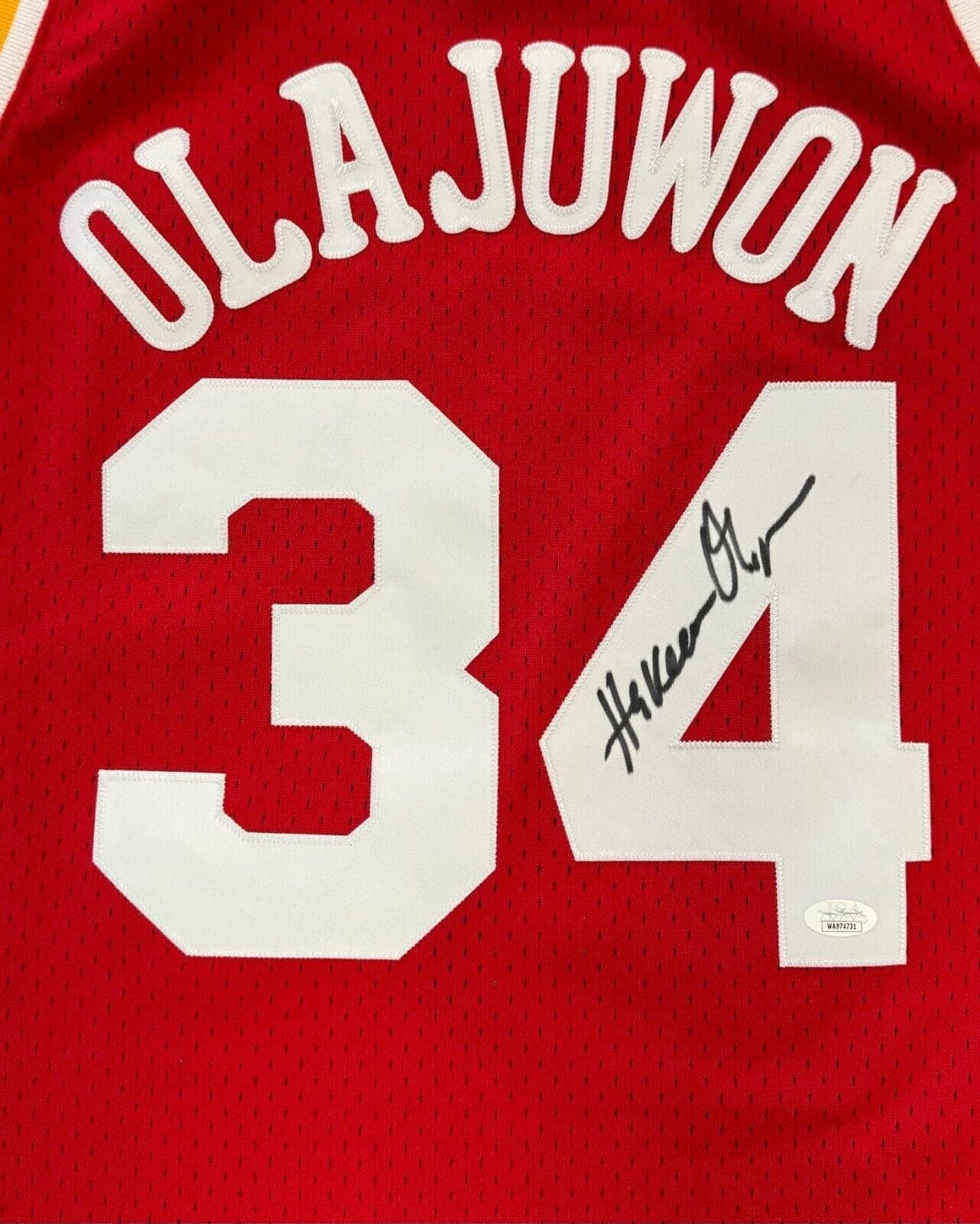 Hakeem Olajuwon Signed 93-94 Mitchell & Ness Hardwood Classics Rockets Jersey JS Hakeem Olajuwon Jersey 93-94-mitchell-ness-hardwood-classics, Houston Rockets, view 2, supplier stock photo