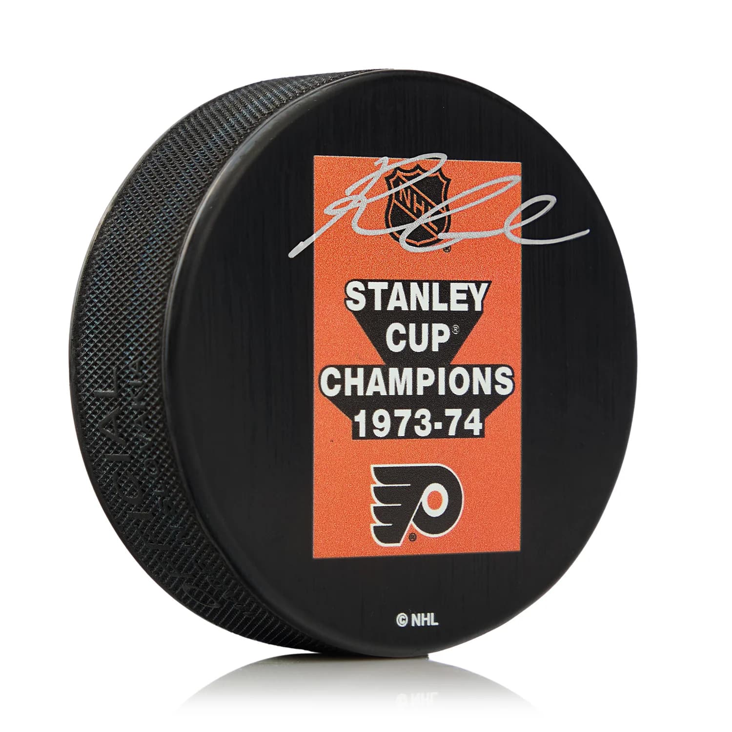 Reggie Leach Autographed Philadelphia Flyers 1974 Stanley Cup Puck Reggie Leach Puck 1974-stanley-cup, Philadelphia Flyers, supplier stock photo