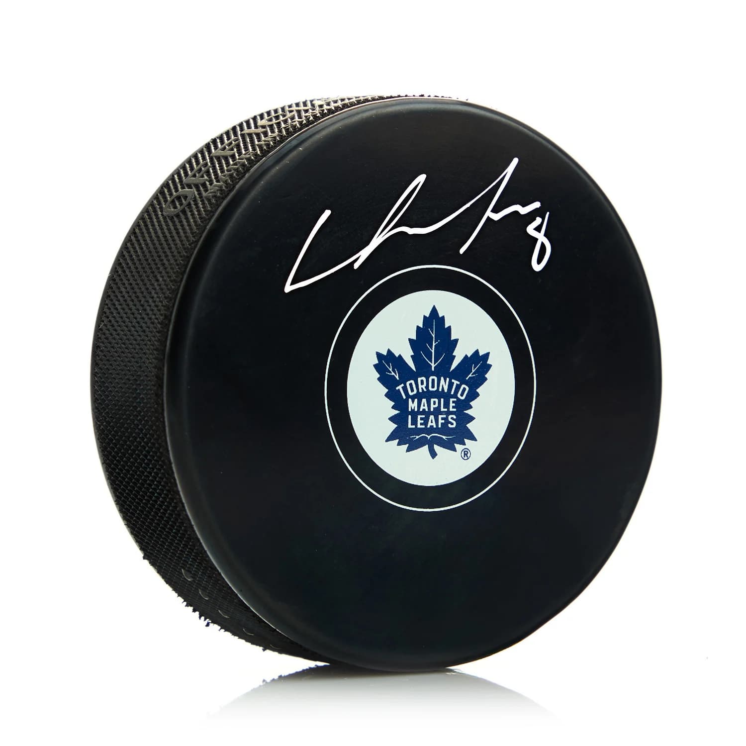 Chris Tanev Autographed Toronto Maple Leafs Hockey Puck Chris Tanev Puck hockey, Toronto Maple Leafs, supplier stock photo