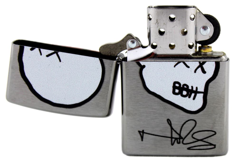 Norman Reedus Exclusive Zippo Lighter with Big Bald Head Logo – Chrome with White Logo Norman Reedus Other norman-reedus-zippo-lighter-big-bald, view 2, supplier stock photo