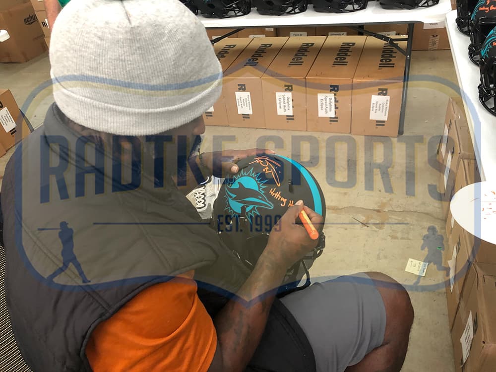 Ricky Williams Signed Miami Dolphins Speed Authentic Eclipse NFL Helmet with “Hitting Holes, Smoking Bowls” Inscription Ricky Williams Helmet ricky-williams-miami-dolphins-speed-eclipse, Miami Dolphins, view 2, supplier stock photo