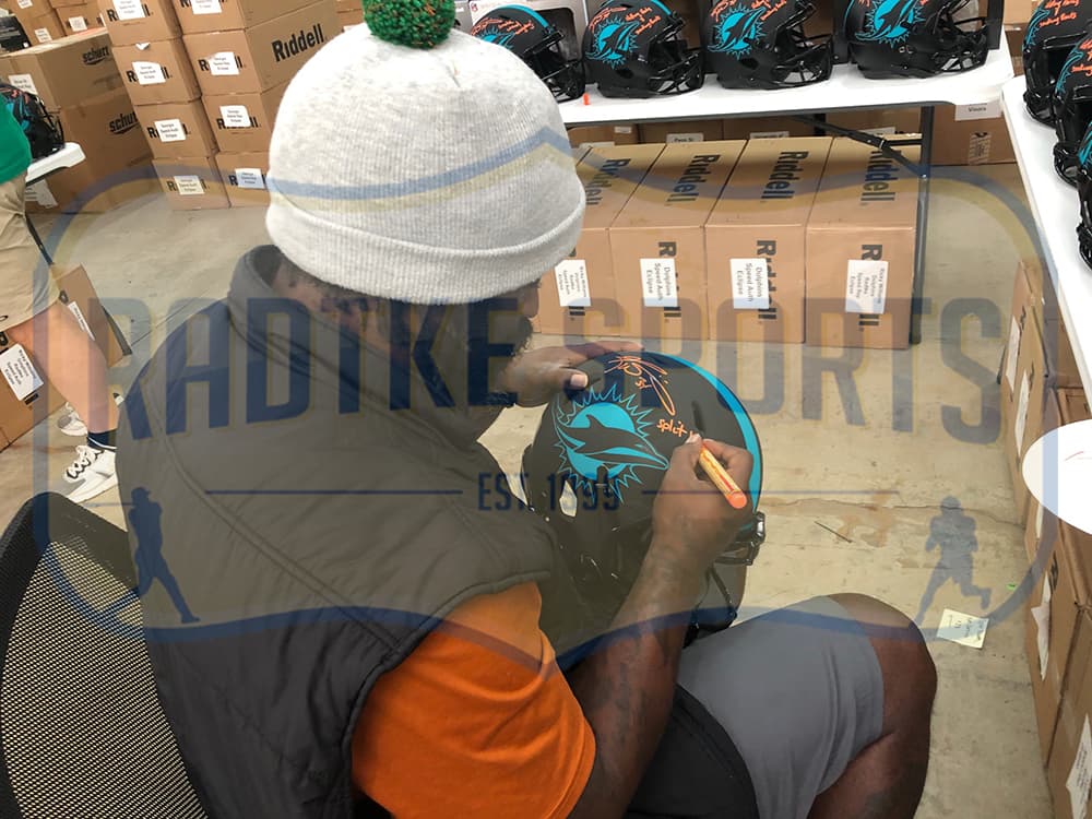 Ricky Williams Signed Miami Dolphins Speed Authentic Eclipse NFL Helmet with “Split Blunts, Not Carries” Inscription Ricky Williams Helmet ricky-williams-miami-dolphins-speed-eclipse, Miami Dolphins, view 2, supplier stock photo