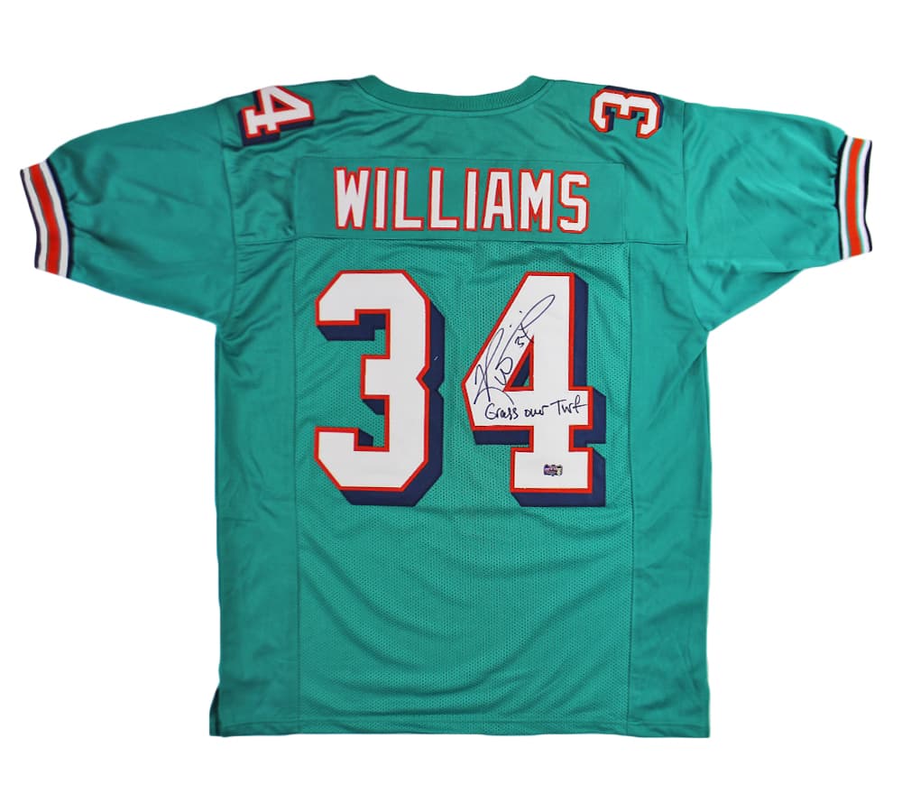 Ricky Williams Signed Miami Custom Teal Jersey with “Grass Over Turf” Inscription Ricky Williams Jersey ricky-williams-miami-teal-grass-over, supplier stock photo